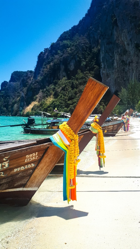 Koh Samui beach with long-tail boats